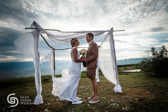 Bride And Groom At An Outdoor Altar At Drakensberg Mountain Retreat